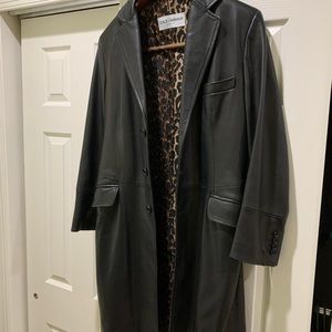 Black Leather coat. Leopard print inside. 3/4 length. Gorgeous/great condition.